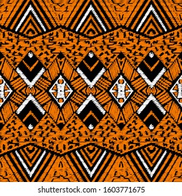 Striped geometric embroidery seamless pattern. Colorful abstract vector background.Textured tapestry ethnic tribal ornament with grunge embroidered rhombus, shapes,  stripes, zigzag lines, stitching.