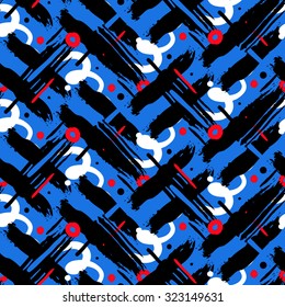 Striped hand painted vector seamless pattern with ethnic and tribal motifs, zigzag lines, brushstrokes and splatters of paint, circles and curls in black and blue colors for summer fall fashion