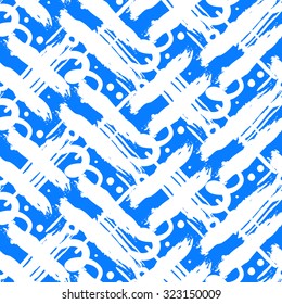 Striped hand painted vector seamless pattern with ethnic and tribal motifs, zigzag lines, brushstrokes and splatters of paint, circles and curls in blue and white colors for summer fall fashion