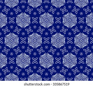 Striped hand painted vector seamless pattern with ethnic and tribal motifs, zigzag lines, brushstrokes and splatters of paint in multiple bright colors. Vector illustration