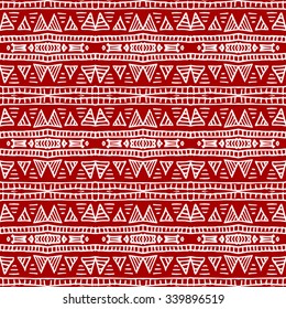 Striped hand painted vector seamless pattern with ethnic and tribal motifs, zigzag lines, brushstrokes and splatters of paint in multiple bright colors. Porcelain tile. Vector illustration.