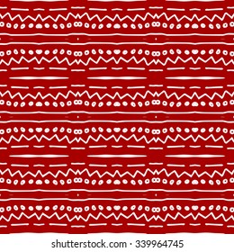 Striped hand painted vector seamless pattern with ethnic and tribal motifs, zigzag lines, brushstrokes and splatters of paint in multiple bright colors. Porcelain tile. Vector illustration.