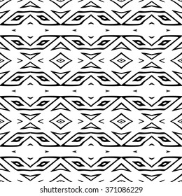 Striped hand painted vector seamless pattern with ethnic and tribal motifs, zigzag lines, brushstrokes paint in monochrome colors. Vector seamless pattern hand drawn. Repeating geometric mesh tiles.