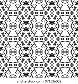 Striped hand painted vector seamless pattern with ethnic and tribal motifs, zigzag lines, brushstrokes paint in monochrome colors. Vector seamless pattern hand drawn. Repeating geometric mesh tiles