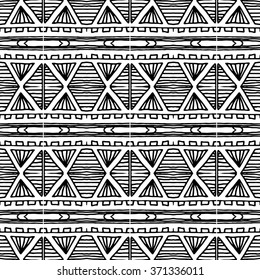 Striped hand painted vector seamless pattern with ethnic and tribal motifs, zigzag lines, brushstrokes paint in monochrome colors. Vector seamless pattern hand drawn. Repeating geometric mesh tiles