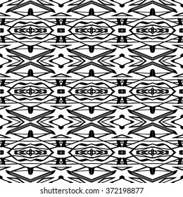 Striped hand painted vector seamless pattern with ethnic and tribal motifs, zigzag lines, brushstrokes paint in monochrome colors. Vector seamless pattern hand drawn. Repeating geometric mesh tiles