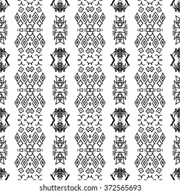 Striped hand painted vector seamless pattern with ethnic and tribal motifs, zigzag lines, brushstrokes paint in monochrome colors. Vector seamless pattern hand drawn. Repeating geometric mesh tiles