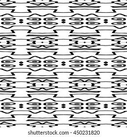 Striped hand painted vector seamless pattern with ethnic and tribal motifs, zigzag lines, brushstrokes paint in monochrome colors. Vector seamless pattern hand drawn. Repeating geometric mesh tiles