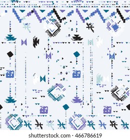 Striped hand painted vector seamless pattern with ethnic and tribal motifs, zigzag lines, brushstrokes and splatters of paint in multiple bright colors for summer fall fashion