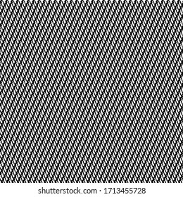 Striped pattern made of obliquely aligned commas. Abstract twill texture. Drawing in black and white.