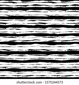 Striped pattern. Seamless texture background. Trendy irregular design. Painted brush strokes stripes. Hand drawn artistic tile. Abstract art fashionable fabric. Vector black and white textile. 