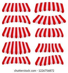 Striped red and white sunshade for shops, cafes and street restaurants