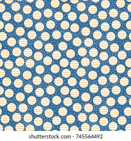 Striped round white gold confetti. Festive seamless pattern. Isolated illustration on color blue background. Concept of Christmas ornaments.