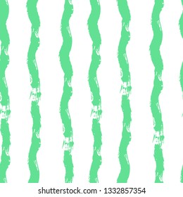 Striped seamless pattern. Abstract stripes. Hand drawing, brushes, blots. Modern textures. Original background. Vertical stripes. Green
