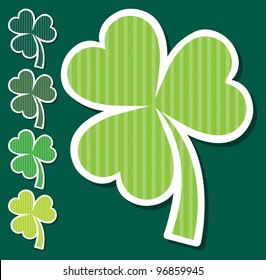 Striped shamrock stickers in vector format.