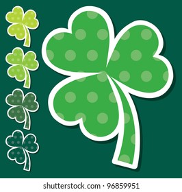 Striped shamrock stickers in vector format.