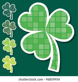Striped shamrock stickers in vector format.
