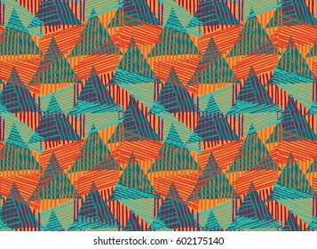 Striped triangles orange blue overlay.Hand drawn with ink seamless background.Creative handmade repainting design for fabric or textile.Geometric pattern with triangles.Vintage retro colors