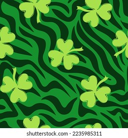 Striped zebra skin seamless pattern with clover in trendy colors. Happy St. Patricks Day. Surface design for textile, fabric, wallpaper, wrapping, gift wrap, paper, scrapbook and packaging