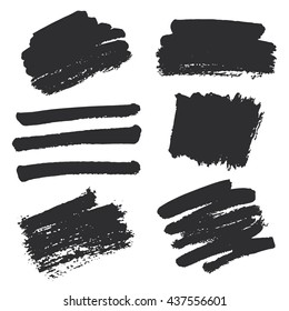 Strokes of black ink on textured paper; brush hand drawn vector; abstract grunge shapes; set of black paint splat design elements