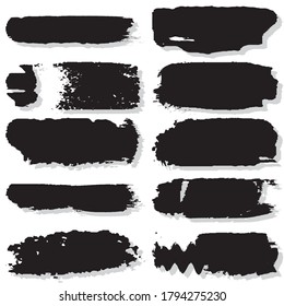 Golpea con un cepillo seco. Textura vectorial de las manchas de pintura. Conjunto de manchas de borrón. La plantilla para el fondo. Tinta negra aislada en blanco
