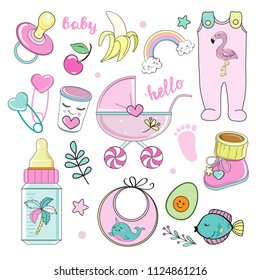 Stroller, nipple, bottle, clothes and other children's accessories on a white background