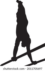 Strong athlete doing street workout and gymnastics elements on parallel bar and horizontal bar.