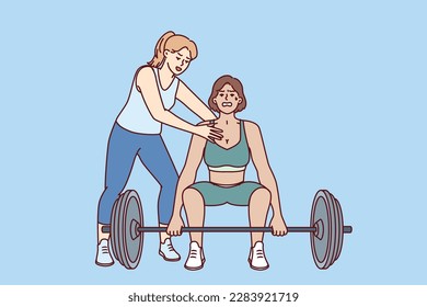 Strong athlete lifts heavy barbell under supervision of personal trainer from gym teaching ward before competition. Bodybuilding trainer supports sportswoman doing pulling exercise in fitness club