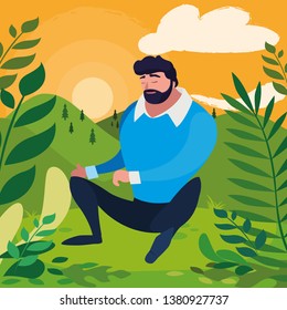 strong and bearded man seated in the field