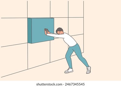 Strong business man installing missing block in wall, building reliable company or startup. Workaholic guy working on building successful career, applying efforts to gradually achieve success