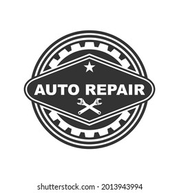A strong and dynamic auto repair logo emblem showcasing mechanical tools such as wrenches, gears, and nuts within a badge style design. Ideal for auto repair shops, mechanic services, car maintenance 