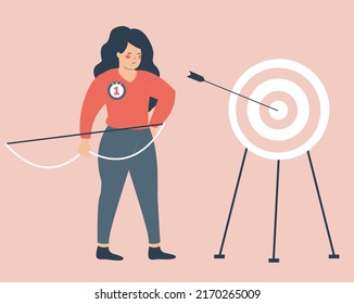 Strong girl shooting a bow and hits the target. Businesswoman achieve her goals in career and life. Woman hits the bull's eye of the dartboard. Concept of Archery, business victory and empowerment. 