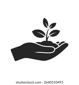 A strong hand gently holds a delicate green sprout, symbolizing growth, new beginnings, and environmental care. 