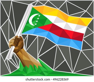 Strong Hand Raising The Flag Of Comoros