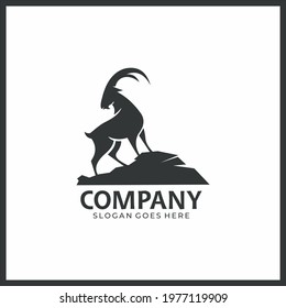 Strong mountain goat or ibex logo mascot.