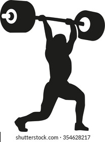 Strong weightlifter with barbell