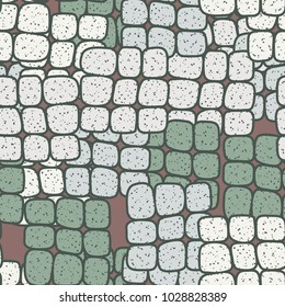 Strongly rounded quadrangles in groups of 9 pieces form a chaotic checkered pattern. Seamless texture. Very fashionable.