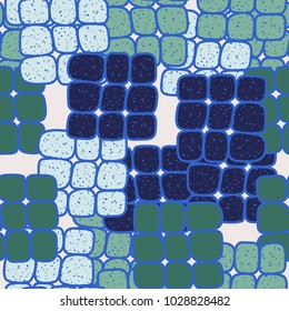 Strongly rounded quadrangles in groups of 9 pieces form a chaotic checkered pattern. Seamless texture. Very fashionable.
