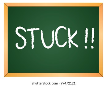 "stuck" word written on chalkboard