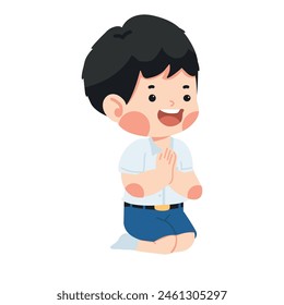 Niño que reza sentado en el piso