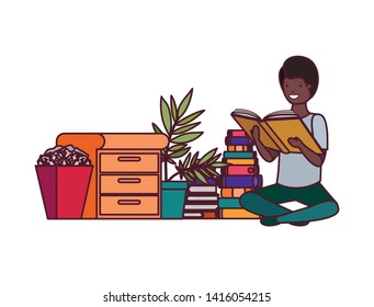 student boy with reading book in the hands