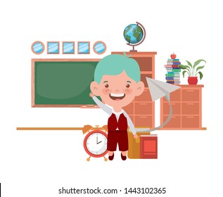 student boy with school supplies in the classroom