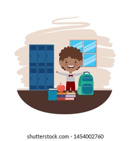 student boy with school supplies in the classroom