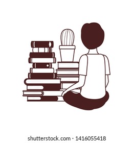 student boy sitting on his back with stack of books