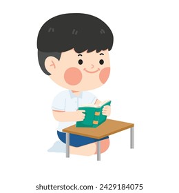 student boy sitting reading a book
