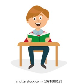 student at a desk with a textbook