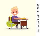 Student elementary school. The schoolboy sits at a school desk. Vector illustration of a flat design
