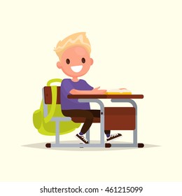 Student elementary school. The schoolboy sits at a school desk. Vector illustration of a flat design