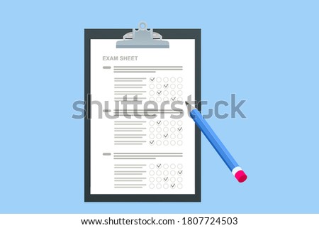 The student filling out answers to exam test answer sheet with a pencil. School and Education. Test score sheet with answers