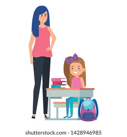 student girl in school desk with female teacher
